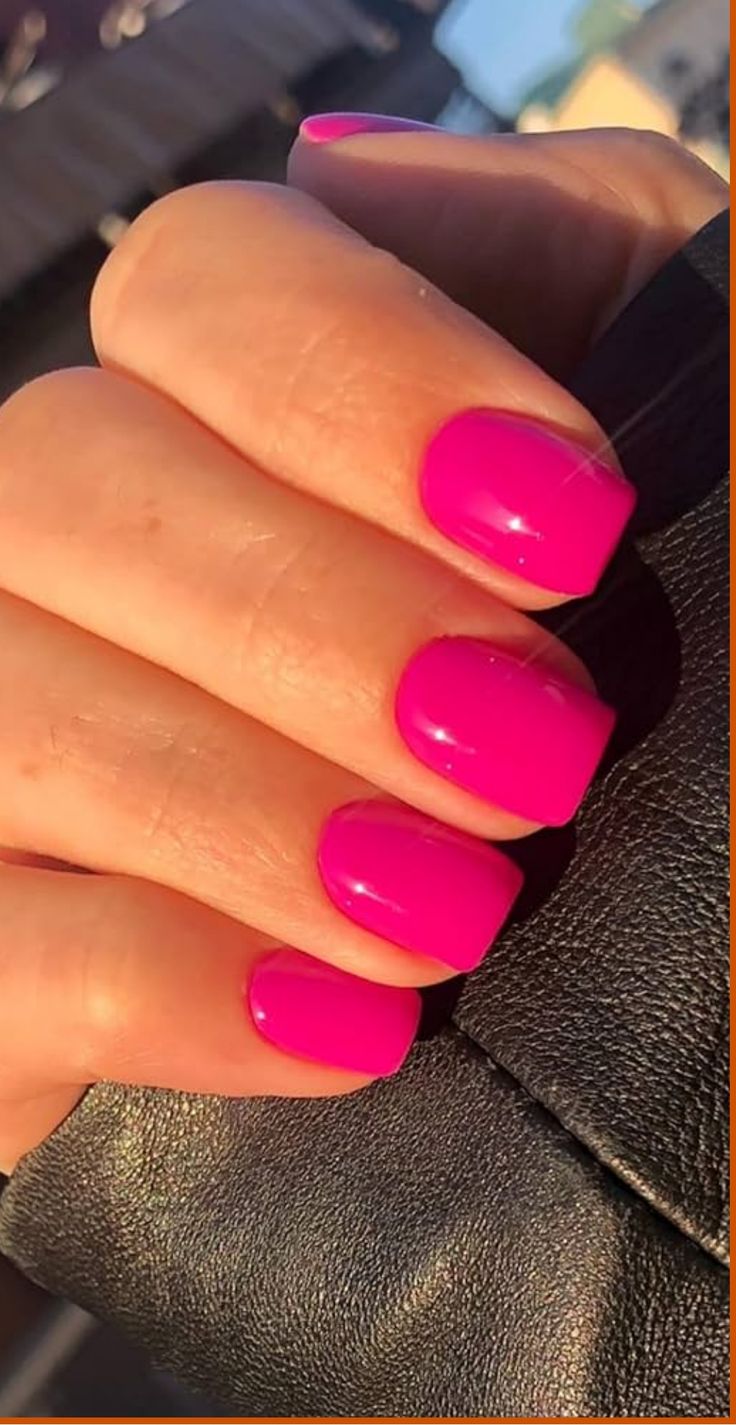 Bold and Playful: Vibrant Pink Manicure with Glossy Finish