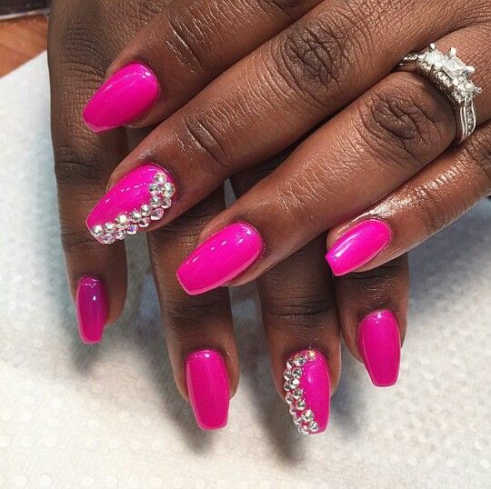 Chic Vibrant Pink Nail Design with Glossy Finish and Sparkling Rhinestones