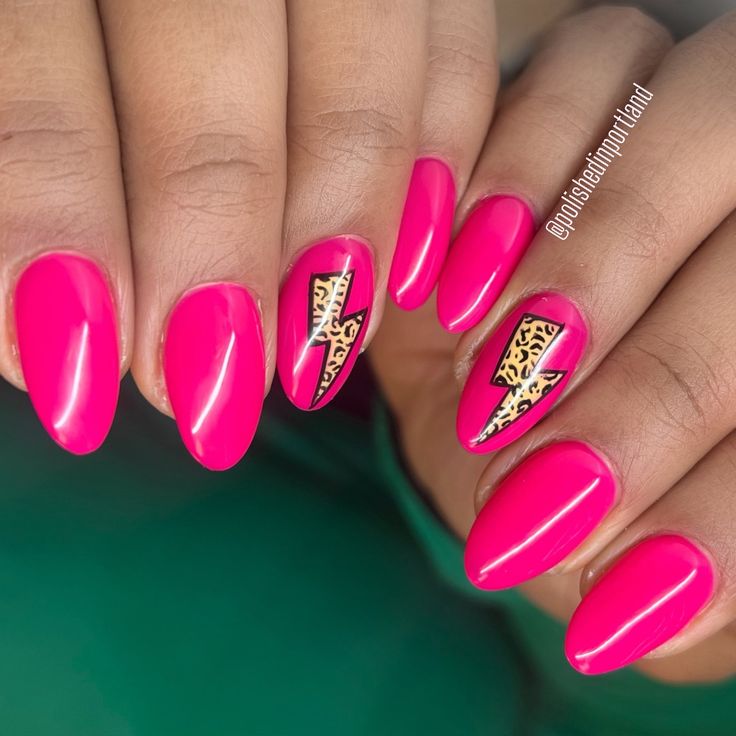 Bold Pink and Glossy Nail Design with Leopard Print and Lightning Bolt Accents.