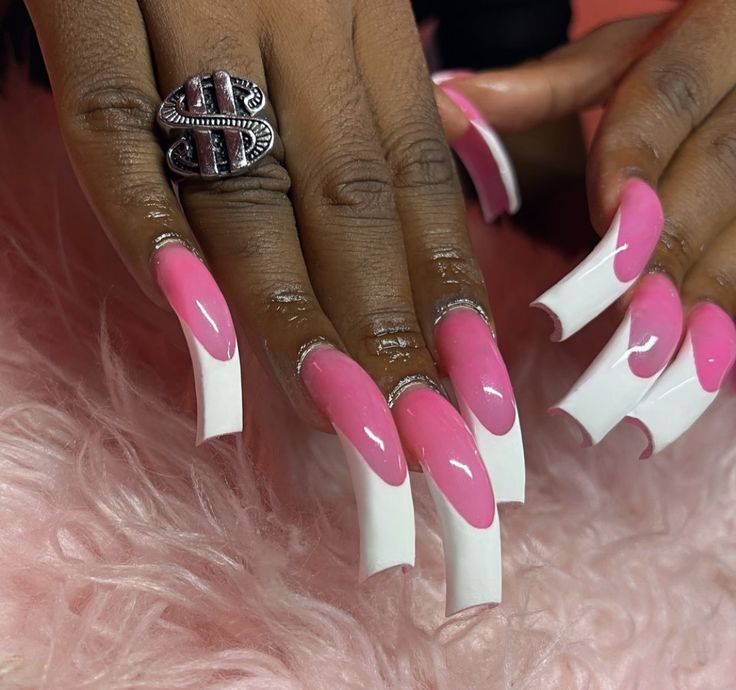 Chic Pink and White Ombre Long Nails with Decorative Ring for a Striking Statement.