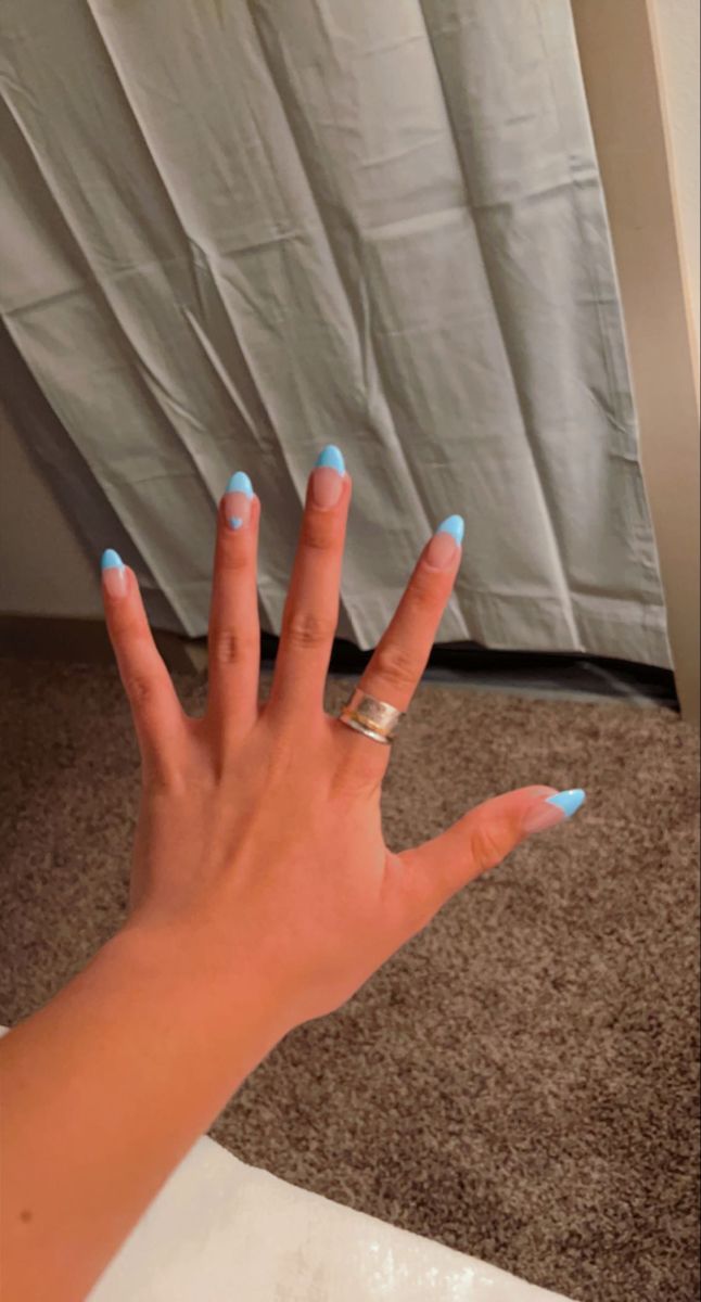 Pastel Blue French Tip Nail Design: A Chic and Fresh Summer Look.