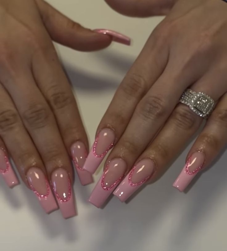 Elegant Gradient Pink Nail Design with Rhinestone Detailing and Long Square Shape.