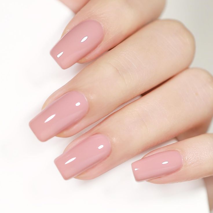 Sophisticated Elegant Nude Pink Nails: Modern Medium-Length Square Design with Glossy Finish.