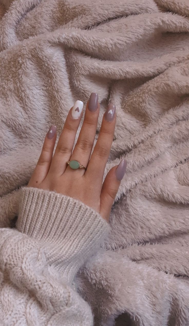 Chic Muted Lavender Nail Design with Heart Accent for a Cozy Look