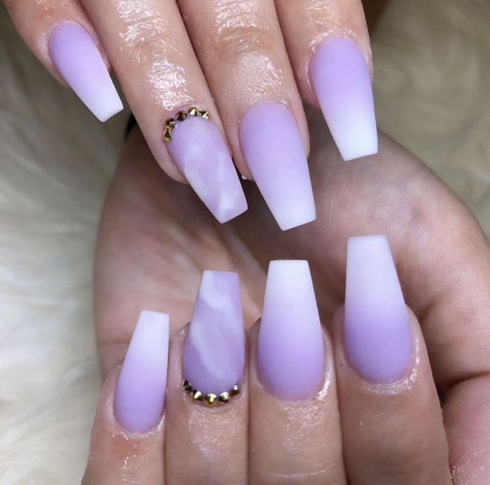 Elegant Ombre Lavender Nails with Marble Design and Gold Stud Accents.