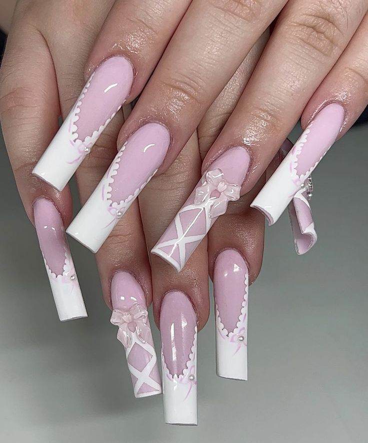 Sophisticated Pink and White Lace Nail Design with Delicate Bows for Special Occasions.