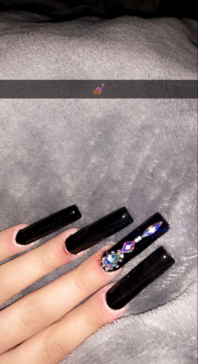 Bold Black Nails Embellished with Colorful Rhinestones for Stunning Statement Art.