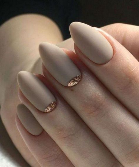 Sophisticated Matte Nude Nails with Glitter Tips for a Chic Look.