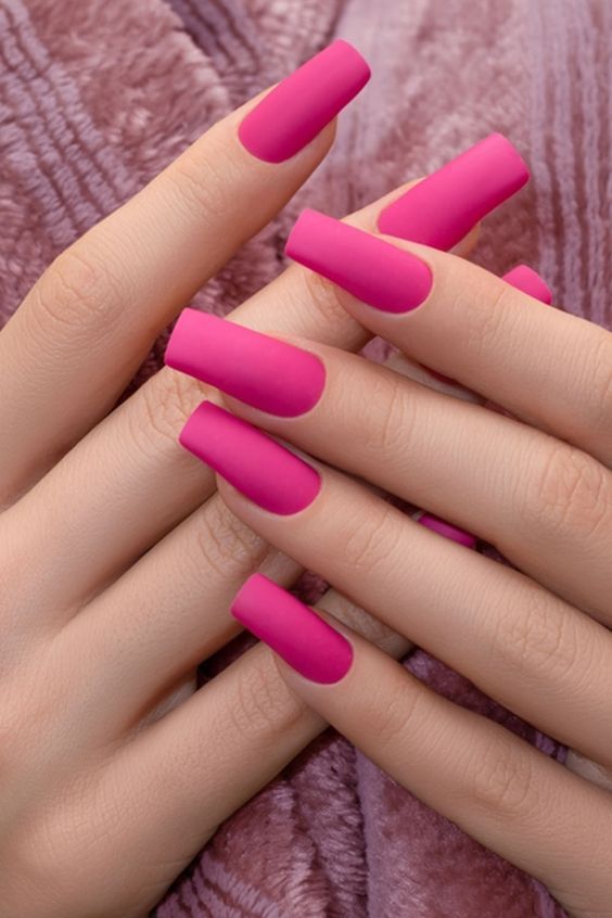 Bold Vibrant Pink Matte Square Nails: A Chic Statement Look for Any Occasion.