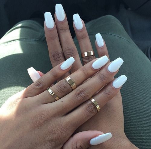 Chic Elegant White Nail Design with Glossy Finish and Gold Ring Accents