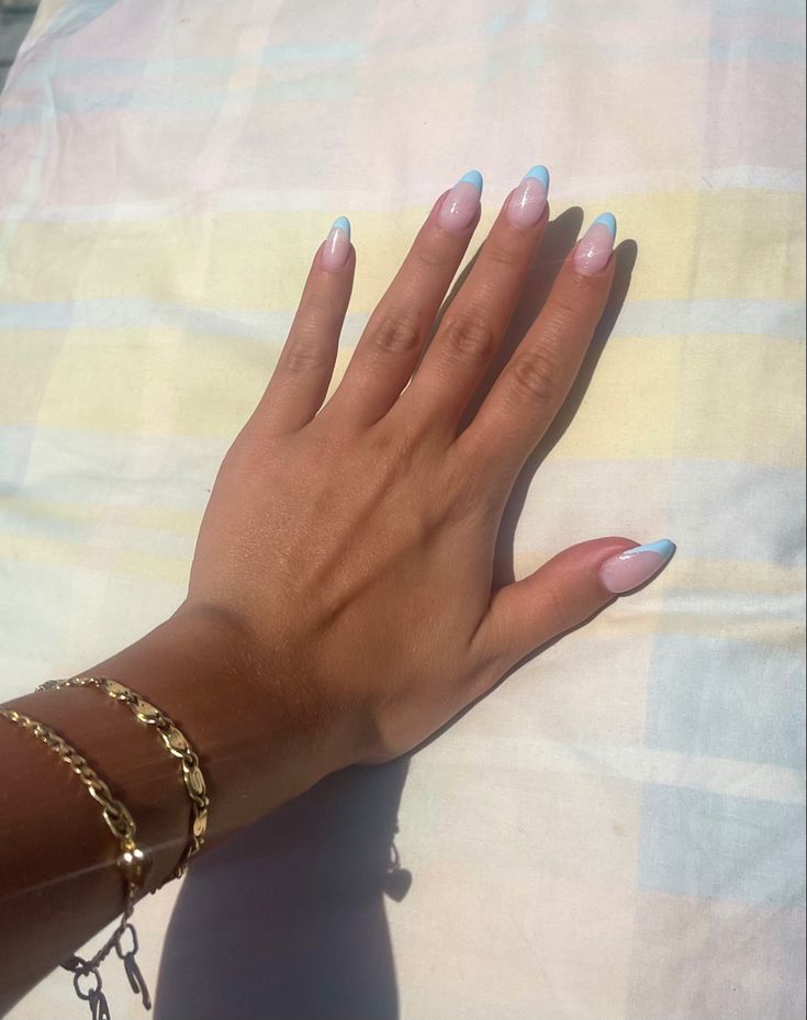 Elegant Pastel Gradient Nail Design Enhanced by a Chic Gold Bracelet.