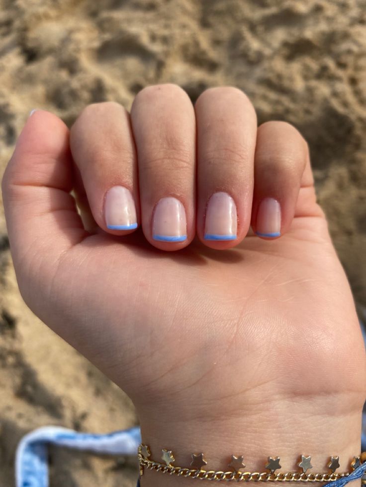 Chic Summer Nail Design with Natural Base and Light Blue Tips