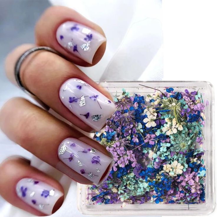 Elegant Lavender Floral Nail Design with Shimmering Silver Accents