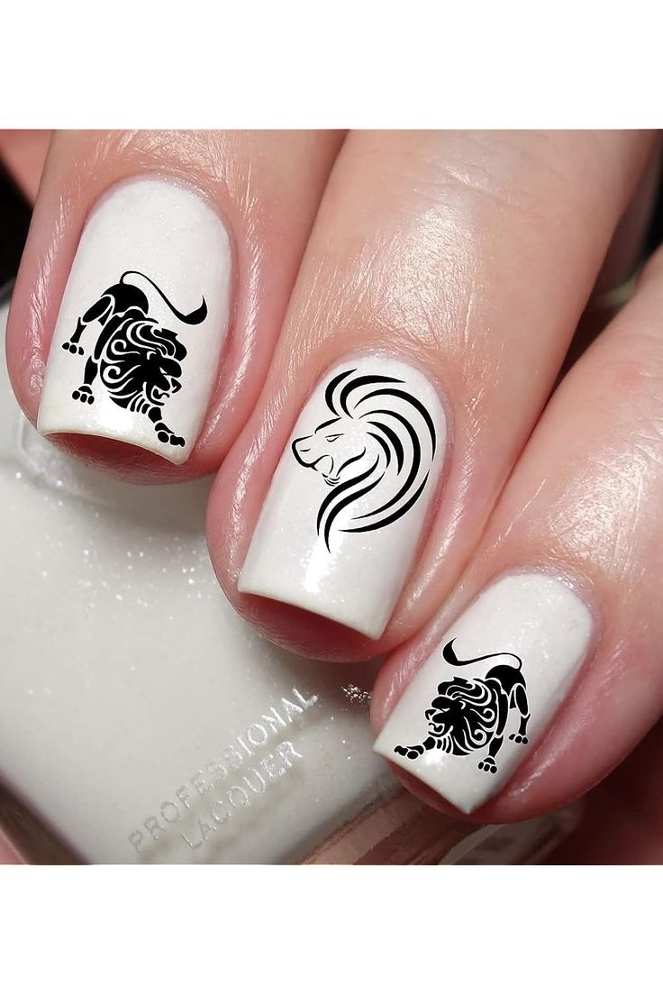 Elegant Lion Motif Nail Design: Bold Artistry on a Glossy White Base.