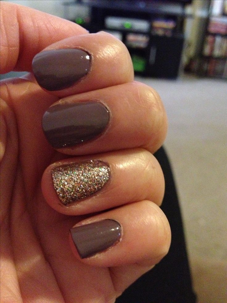 Sophisticated Elegance: Muted Purple Nail Design with Glitter Accents