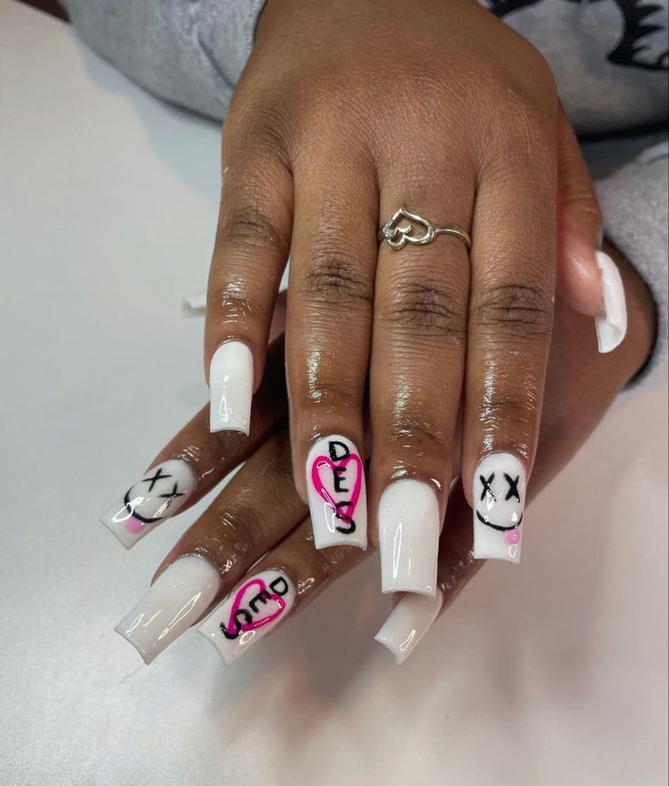 Chic Long Nails with Glossy White Base and Playful Smiley and Heart Designs.