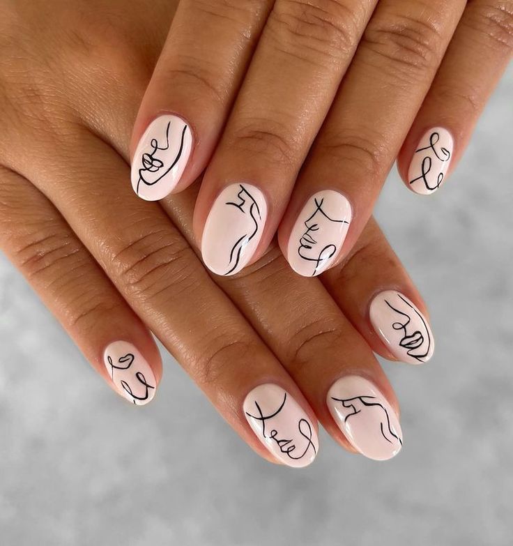 Chic Abstract Line Art Nail Design: Elegant Black Drawings on Soft Pink Background.