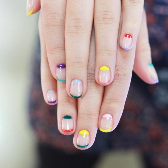 Vibrant Geometric Nail Design: A Fun Blend of Shapes and Modern Styles