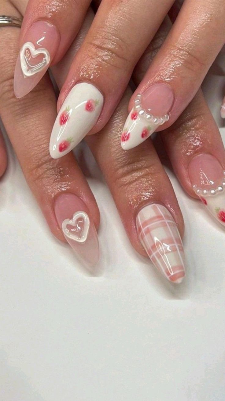 Charming Pastel Nail Design with Whimsical Patterns and Elegant Finishes.