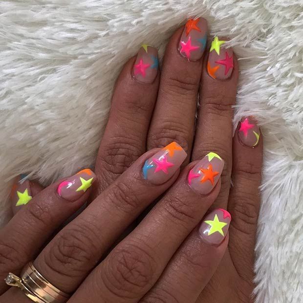 Neon Star-Themed Nail Design: A Playful and Bold Statement.