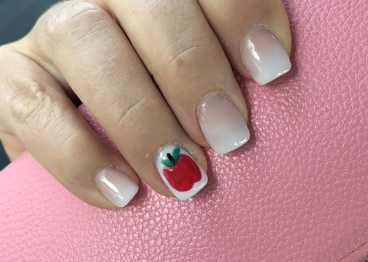 Ombre Nail Design with Playful Apple Illustration for a Whimsical Autumn Touch