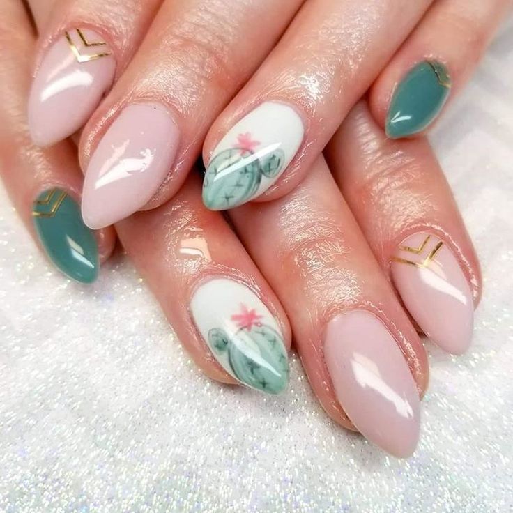 Chic Soft Pink and Teal Nail Design with Floral Patterns and Gold Accents.