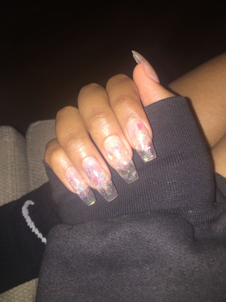 Elegant Ombre Glittery Nail Design with Translucent Pink and Iridescent Sparkles