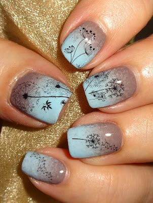 Charming Floral Nail Art: Whimsical Dandelion Silhouettes in Soft Blue and Lavender Gradient.