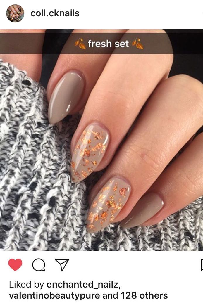 Sophisticated Taupe Nail Design with Shimmering Gold Glitter Accents