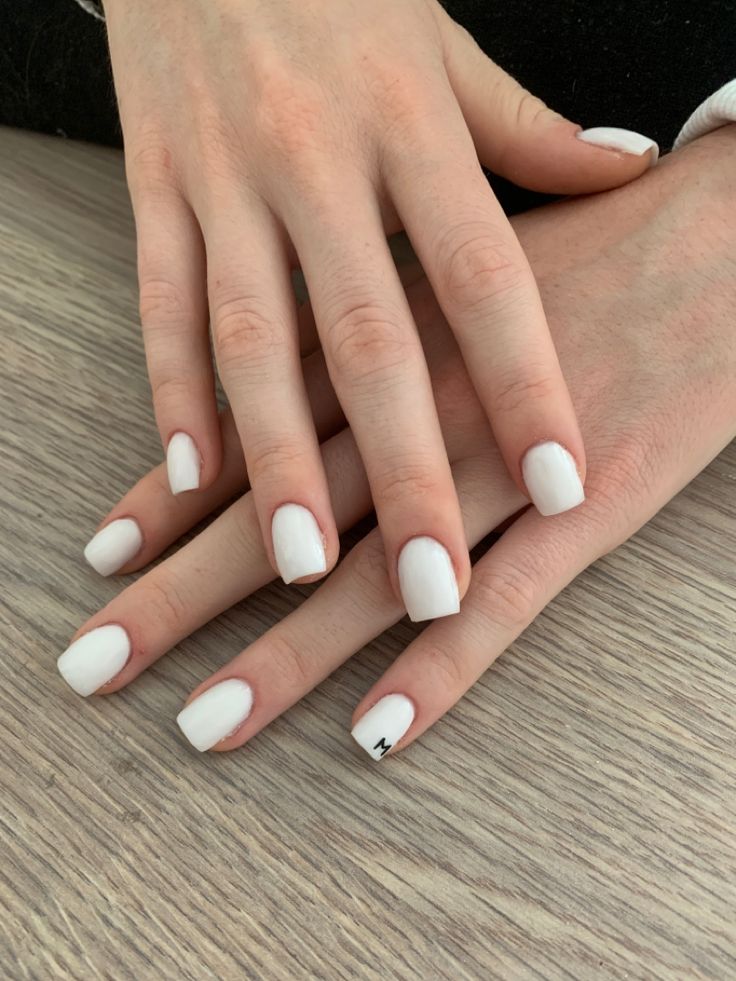 Matte Elegant White Nail Design with Modern Accent for Versatile Sophistication.