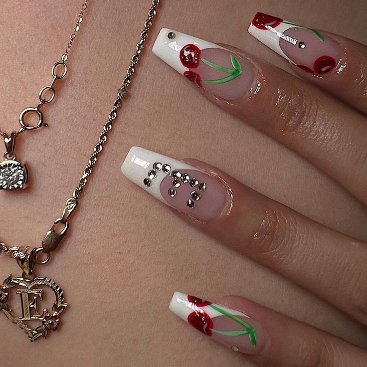 Chic Cherry Nail Design with Glossy Finish and Glamorous Rhinestones.