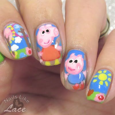 Whimsical Cartoon-Inspired Colorful Nail Art with Bright Blue Hues and Floral Accents.