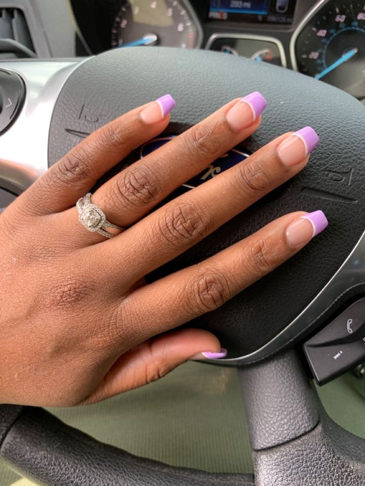 Chic Lavender Tipped Nail Design with Subtle Ombre and Sophisticated Ring Accents