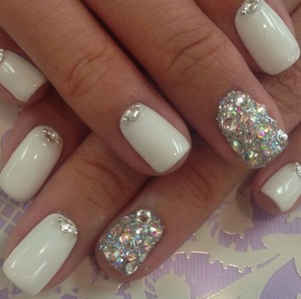 Sophisticated Elegant White Nail Design with Matte, Glossy Finishes, and Glamorous Rhinestones.