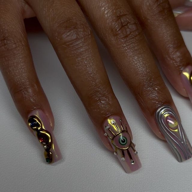 Chic Abstract-Metallic Nail Design with Intricate Patterns and Glossy Nude Base