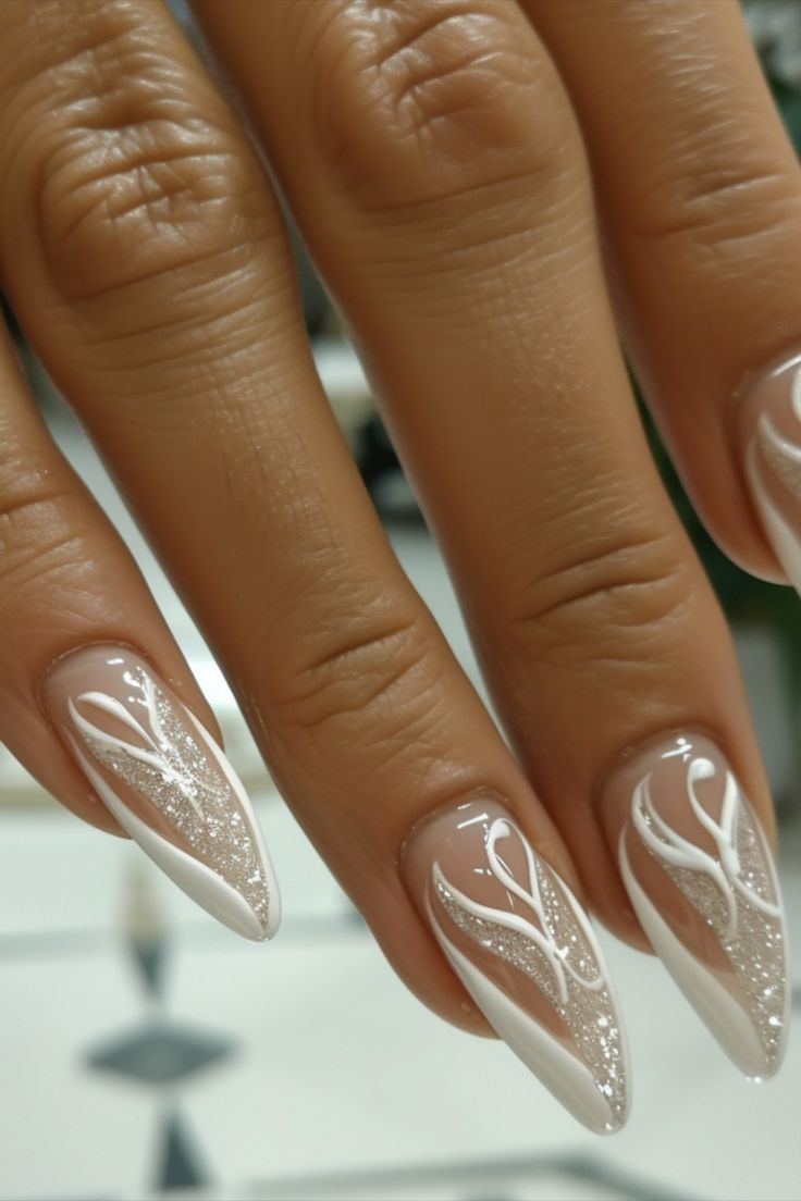 Sophisticated Almond-Shaped Nails with Elegant White Swirls and Shimmering Accents