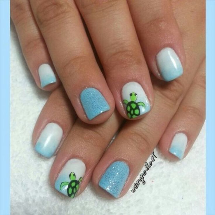 Playful Ocean-Inspired Nail Design with Soft Blue Gradient and Turtle Illustrations