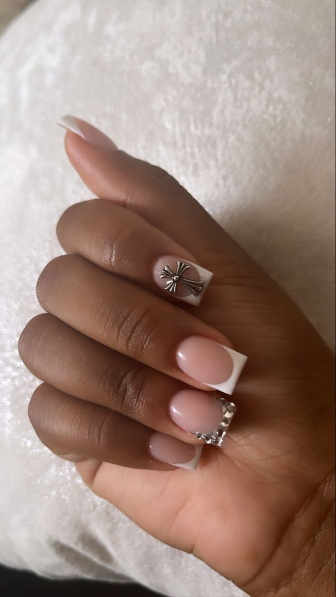 Chic French Manicure with Metallic Accents: A Sophisticated Nail Design for Any Occasion