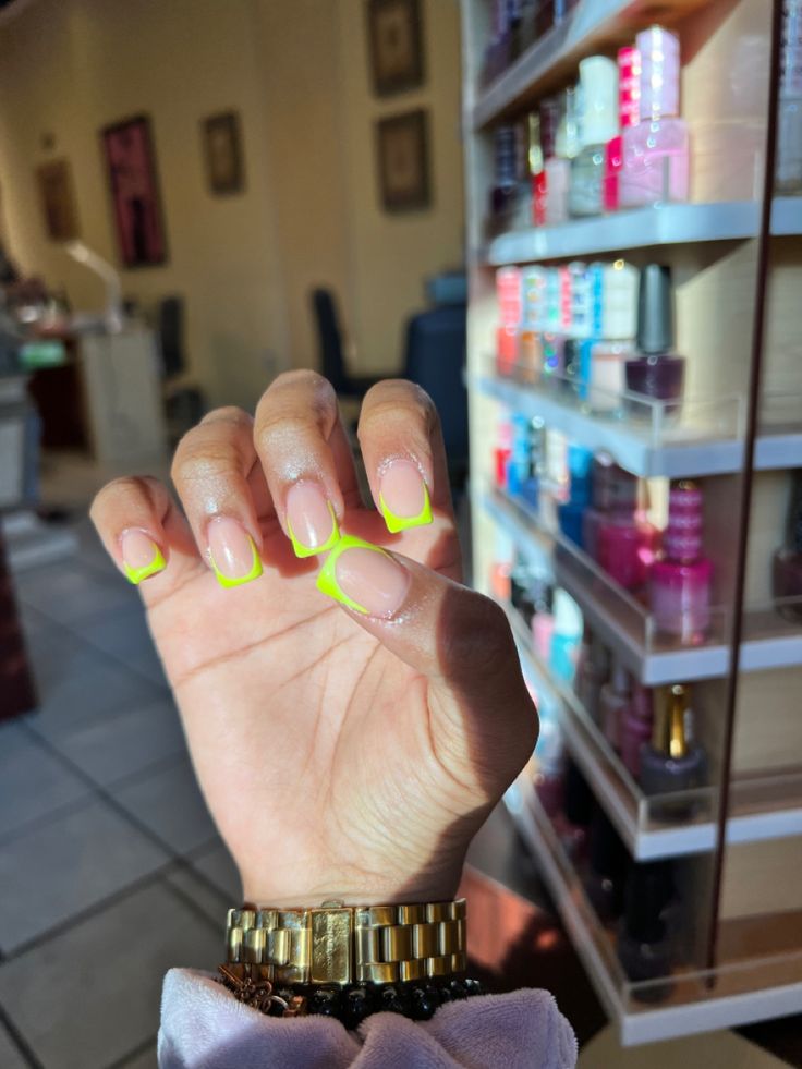 Vibrant Neon Yellow-Tipped Nail Design: A Fresh and Playful Trend for Bold Occasions.