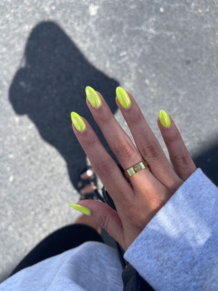 Bold Neon Yellow Almond Nails: A Playful Summer Statement.