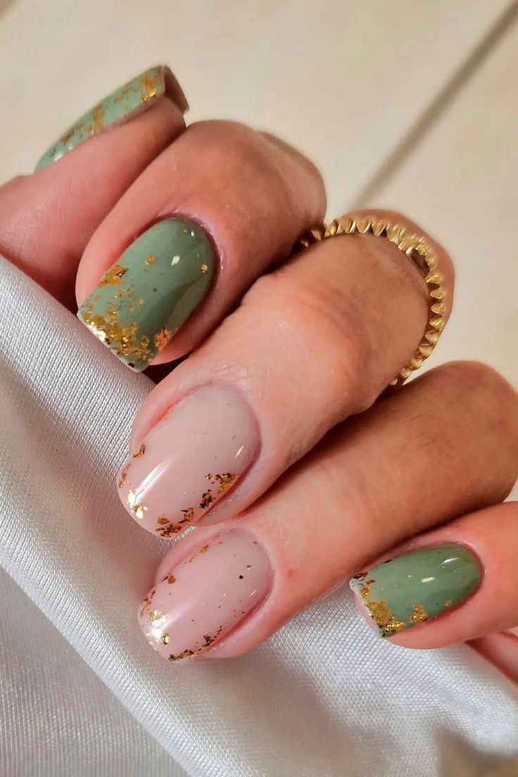 Elegant Chic Nail Design in Muted Greens and Soft Nudes with Gold Accents.