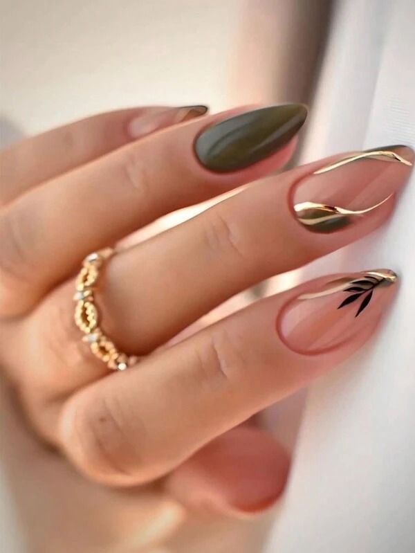 Elegant Green and Nude Nail Design with Gold Accents and Leaf Motif.