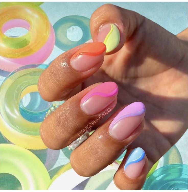 Playful Pastel Wave Nail Design for a Chic Summer Look