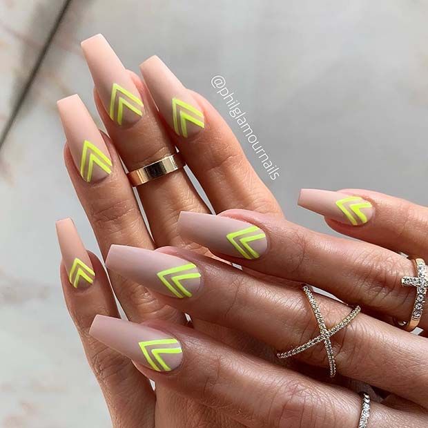 Chic Matte Long Nails with Bold Neon Yellow Geometric Chevron Designs