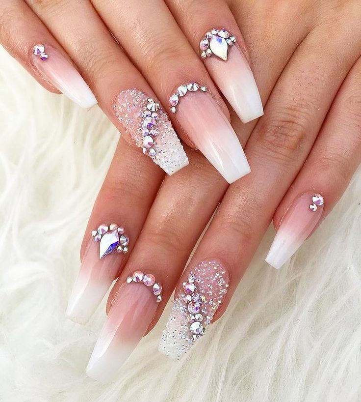 Sophisticated Ombre Nail Design with Glamorous Glitter and Rhinestones.