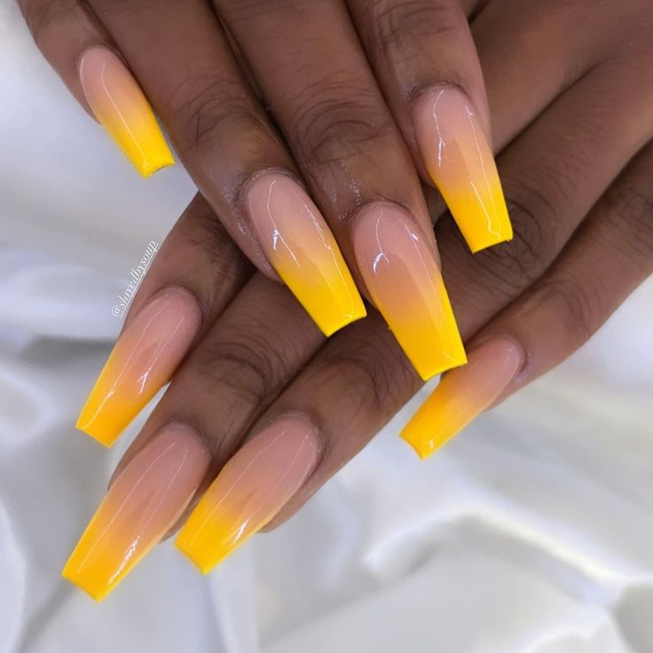 Vibrant Yellow Ombre Nail Design with Glossy Finish for a Cheerful Statement.