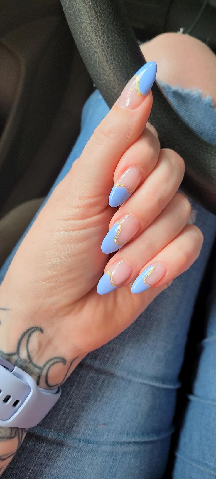 Chic Pastel Blue Almond Nails with Gold Accents and Nude Base