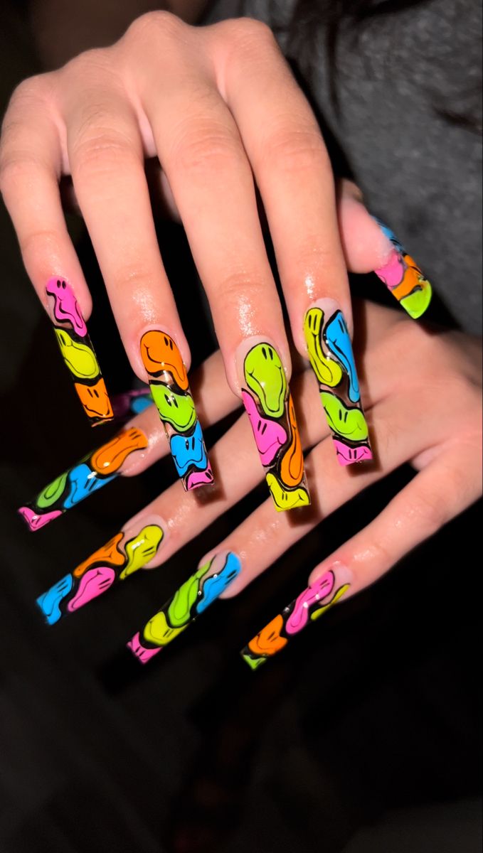 Playful Abstract Nail Design with Vibrant Colors for Creative Expression.