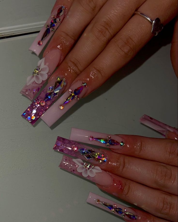 Elegant Long Square Nail Design with Colorful Embellishments and Floral Accents