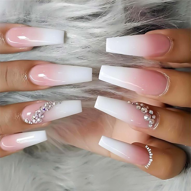 Chic Ombre Nail Design: Soft Pink and White Gradient with Glam Rhinestones